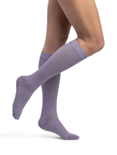 Lady wearing her Sigvaris Linen 252CW 20-30 mmHg Compression Socks color Lavender