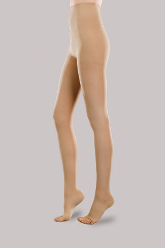 Lady wearing her Ease Sheer 20-30 mmHg compression open-toe pantyhose by Therafirm in color sand
