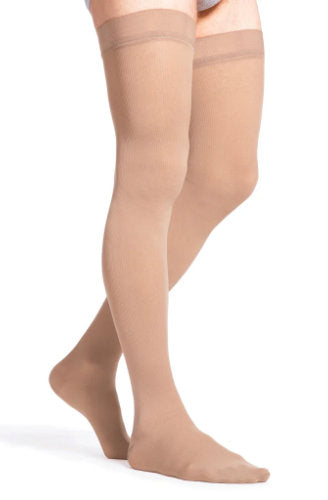 Sigvaris 863N Essential Opaque for Men Closed Toe Thigh High Compression Stockings with Silicone Top Band in the color light beige