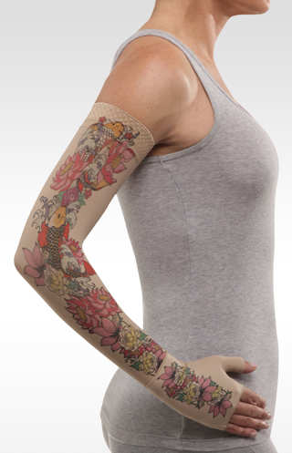 Juzo Soft Arm Sleeve with Silicone band in the Koi Flowers Tattoo Print. Available in 15-20 mmHg, 20-30 mmHg, and 30-40 mmHg Compression