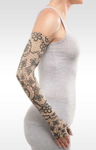 Juzo Soft Arm Sleeve with Silicone Band in the MOSAIC HENNA-BEIGE Print. Available in the 15-20 mmHg, 20-30 mmHg, and 30-40 mmHg Compression