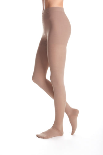 Lady wearing her Mediven Duomed Advantage 30-40 mmHg Waist High Compression Stockings in the color Beige