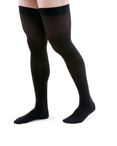 Man wearing Medi Duomed Advantage Thigh High Compression Stockings in the color Black