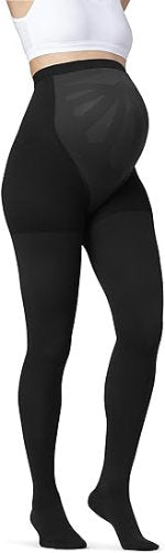 Lady wearing her maternity compression stockings in the color black.