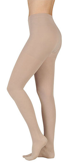 Woman wearing her Juzo Soft 2082AT Maternity Pantyhose in the color Beige