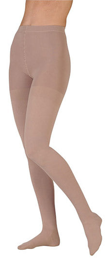 Lady wearing her Juzo Dynamic Waist High Closed Toe 40-50 mmHg Compression Stockings Color Beige