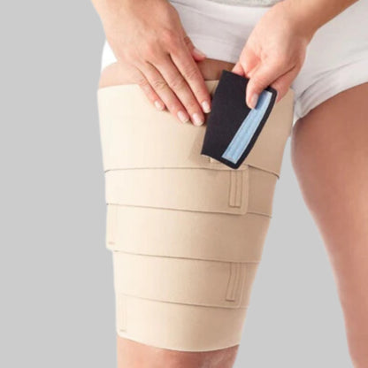 Lady applying her Solaris ReadyWrap begie colored thigh wrap.