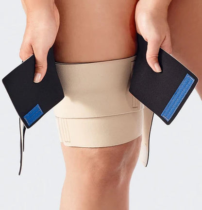 Lady starting to apply the Solaris ReadyWrap thigh in the color beige.