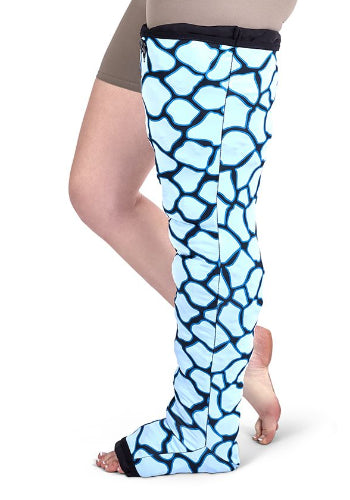 Person wearing their Circaid Profile Nighttime Foam Full Leg Sleeve with the blue giraffe colored energy oversleeve 