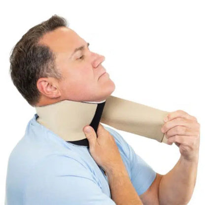 A man putting on his circaid head and neck reduction kit for the management of lymphedema