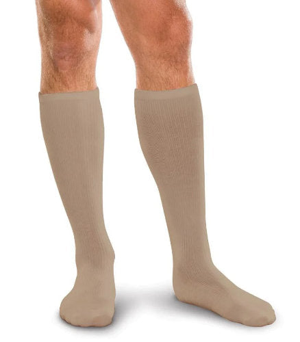Male wearing his Therafirm Core-Spun 10-15 mmHg Compression support socks in the color Khaki