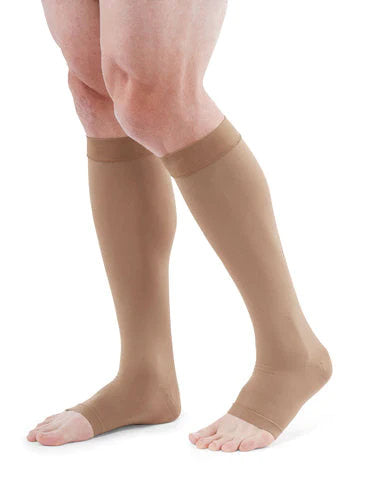 Man wearing his Medi Duomed Advantage Open Toe Compression Stockings in the color Almond