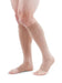 Man wearing his Medi Duomed Advantage Open Toe Compression Stockings in the color Beige