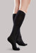 Lady's leg wearing the Ease Microfiber compression stocking by Therafirm in the color Black