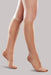 Lady's leg wearing the Ease Microfiber compression stocking by Therafirm in the color Sand
