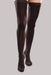 Lady's leg wearing the Ease Microfiber thigh high 20-30 mmHg compression stocking by Therafirm in the color Black