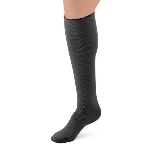 Person wearing the L&R ExoStrong below knee compression stocking with closed toe.