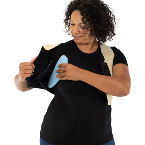 lady placing the FLEC foam pad under her reduction kit for added support