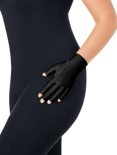 Lady wearing her Jobst Bella Lite 15-20 mmHg compression glove in the color black.