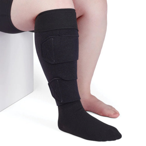 Lady wearing her Circaid JuxtaLite HD velcro compression wrap in the color Black. 