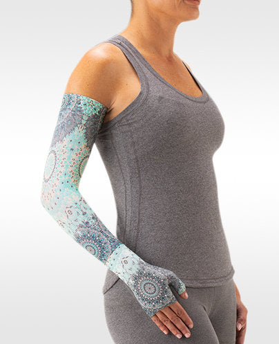 Juzo Soft Print Series TEAL STARBURST Arm Sleeve is offered in 15-20 mmHg, 20-30 mmHg, and 30-40 mmHg Compression Levels