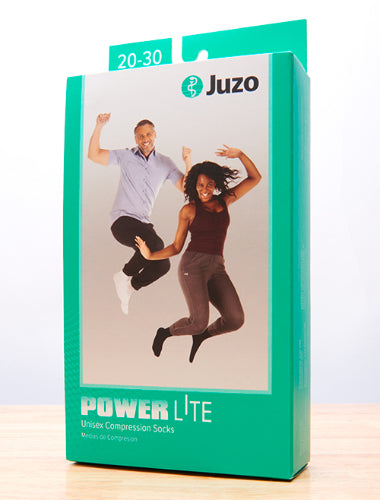 Product Packaging for the Juzo Power Lite Knee High Compression Socks 15-20 mmHg in the color White |@ CompressionCareCenter.com an Authorized Juzo Reseller