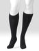 Display showing a pair of Juzo Power Wool 15-20 mmHg compression knee high socks in the color charcoal