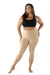 Lady smiling while wearing her new Juzo Sensation compression Capris that are made for lipedema. In the color beige.