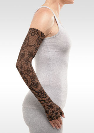 Juzo Soft Arm Sleeve with Silicone Band in the MOSAIC HENNA-CHESTNUT Print. Available in the 15-20 mmHg, 20-30 mmHg, and 30-40 mmHg Compression