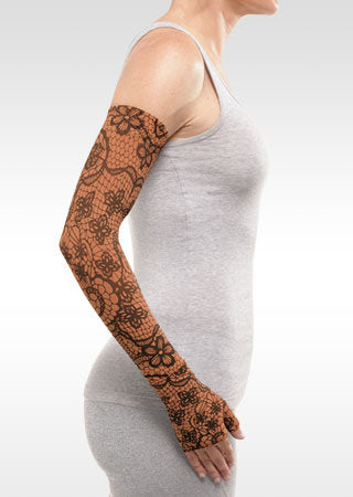 Juzo Soft Arm Sleeve with Silicone Band in the MOSAIC HENNA-CINNAMON Print. Available in the 15-20 mmHg, 20-30 mmHg, and 30-40 mmHg Compression