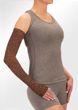 Juzo Soft Arm Sleeve with Silicone Band in the Paisley Henna Chestnut Print. Available in 15-20 mmHg, 20-30 mmHg, and 30-40 mmHg Compression