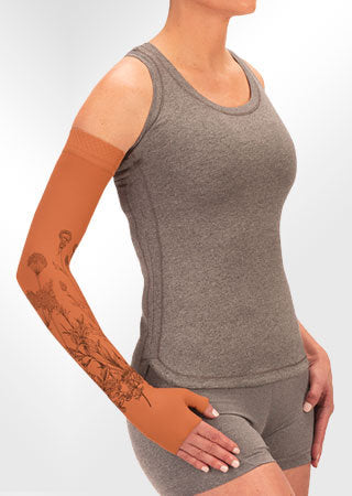 Juzo Soft Arm Sleeve with Silicone Band in the Wildflower Henna-Cinnamon Print Collection. Available in 15-20 mmHg, 20-30 mmHg, and 30-40 mmHg Compressions