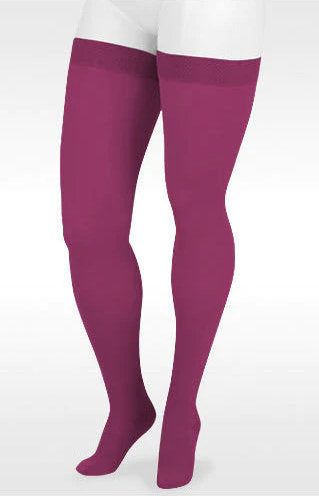 A display leg showcasing the Juzo Soft Closed Toe 20-30 mmHg Compression Thigh Highs in the Color Agate | Trend Colors @ Compression Care Center
