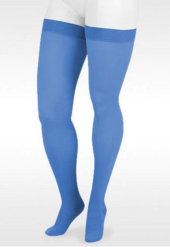 A display leg showcasing the Juzo Soft Closed Toe 20-30 mmHg Compression Thigh Highs in the Color Topaz | Trend Colors @ Compression Care Center