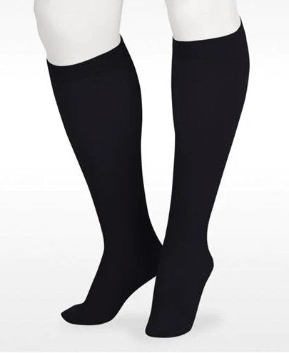 Display showing the Juzo Soft Knee High Closed Toe 15-20 mmHg Compression Stocking Color Black