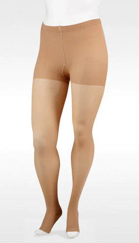 Woman wearing her Juzo Soft 2082AT Open Toe Maternity Pantyhose in the color Beige