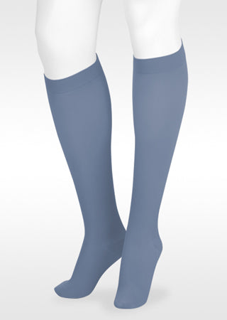 White mannequin displaying Juzo Soft Knee Highs with Silicone band in the New 2026 Trend Color Bombshell Blue 2000AD