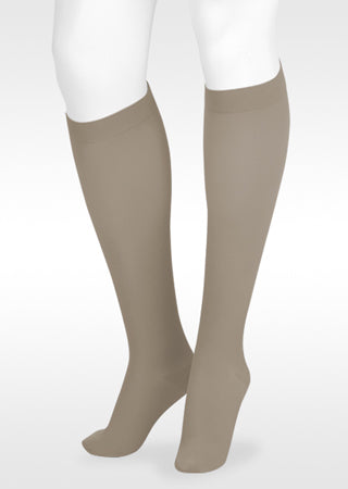White mannequin displaying Juzo Soft Knee Highs with Silicone band in the New 2026 Trend Color Desert Dream 2000AD