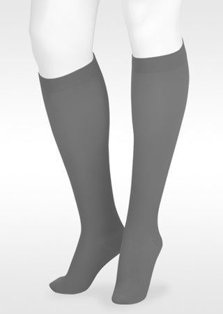 White mannequin displaying Juzo Soft Knee Highs with Silicone band in the New 2026 Trend Color Glam Gray 2000AD