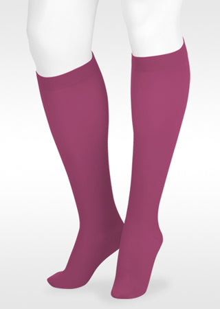 White mannequin displaying Juzo Soft Knee Highs with Silicone band in the New 2026 Trend Color Raspberry Rush 2000AD