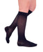 ladies legs wearing a pair of navy colored Mediven Sheer & Soft knee high compression stockings