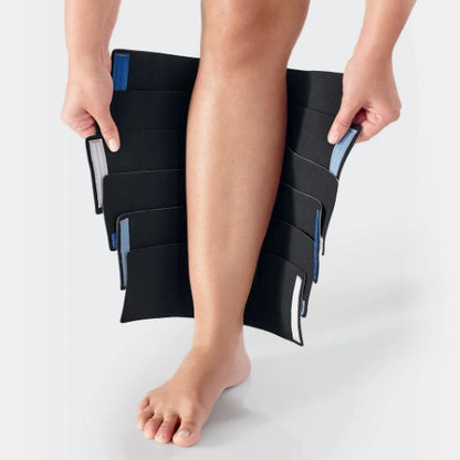 Person holding the L&R ReadyWrap open before putting it on.