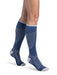 Lady wearing her new Sigvaris 432C Motion Flow Tech 20-30 mmHg compression socks in the color deep sea