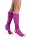 Lady wearing her new Sigvaris 432C Motion Flow Tech 20-30 mmHg compression socks in the color orchid