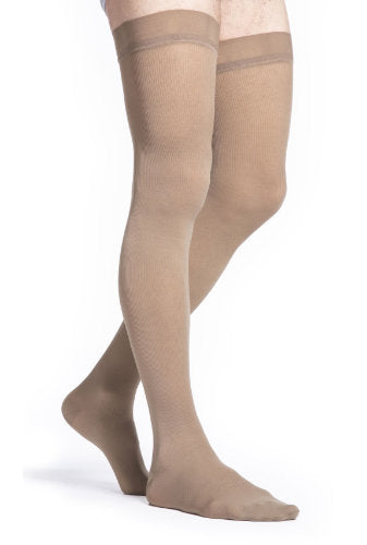 Male wearing Sigvaris 823N Microfiber Thigh High Compression Socks in the color Tan-Khaki