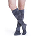 Male wearing his Sigvaris Microfiber Pattern 20-30 mmHg compression knee high in the design graphite argyle.