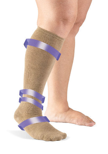 Sigvaris Complete Liner showing areas of compression on the leg color beige