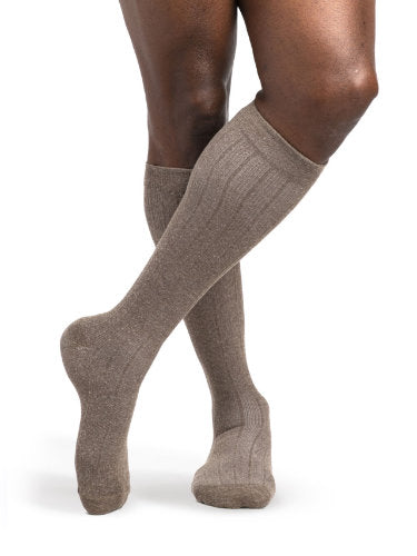 Male wearing his Sigvaris Linen 252CM 20-30 mmHg Compression Socks color Brown