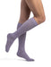 Lady wearing her Sigvaris Linen 252CW 20-30 mmHg Compression Socks color Lavender