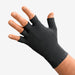 Woman wearing her black colored Solaris ExoStrong Glove with quarter fingers